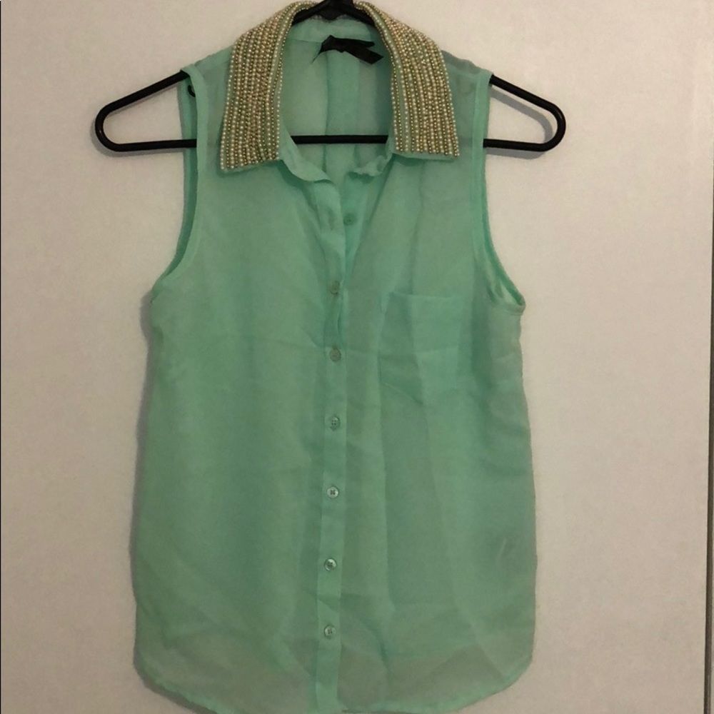 Teal colored tank